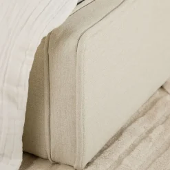 Idimex Lit simple BELARTI 90 x 190 cm rembourré, revêtement en tissu - Blanc crème